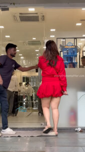 mehreen kaur pirzada hot thick thighs back view in red mini dress HD