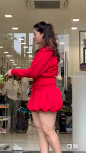 mehreen kaur pirzada hot thick thighs back view in red mini dress HD 2
