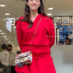mehreen kaur pirzada hot thick thighs back view in red mini dress HD 5